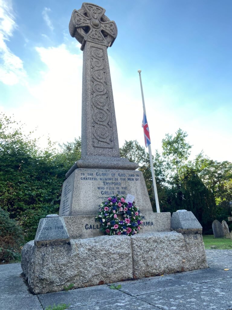War memorial with wreath laid on